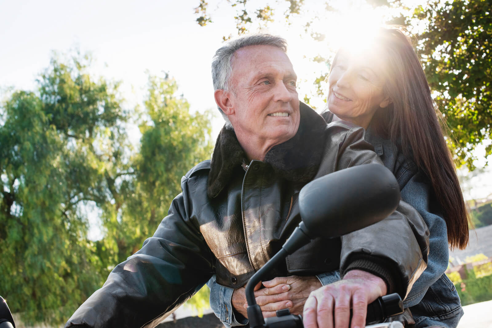 senior-couple-taking-a-ride-on-a-motorcycle-AV3YMTD 2